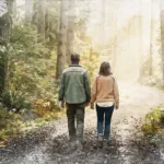 Watercolor and ink illustration of a couple walking side by side on a forest path toward warm sunlight, symbolizing rebuilding trust in a relationship Watercolor and ink illustration of a couple walking side by side on a forest path toward warm sunlight, symbolizing rebuilding trust in a relationship